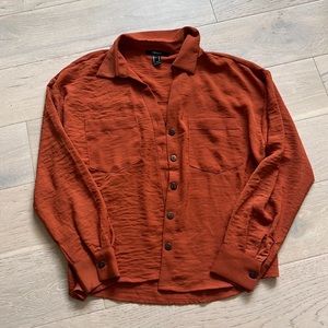 brown/orange jacket